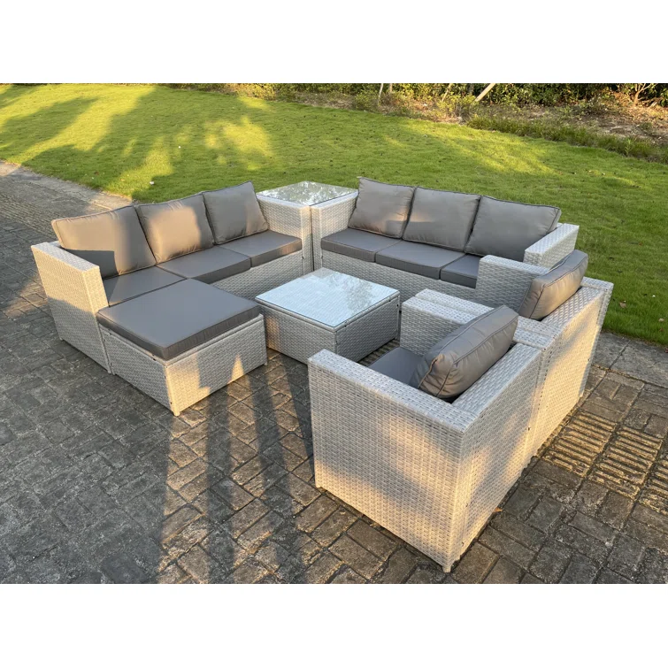 Delaila Rattan 9 - Person Seating Group with Cushions
